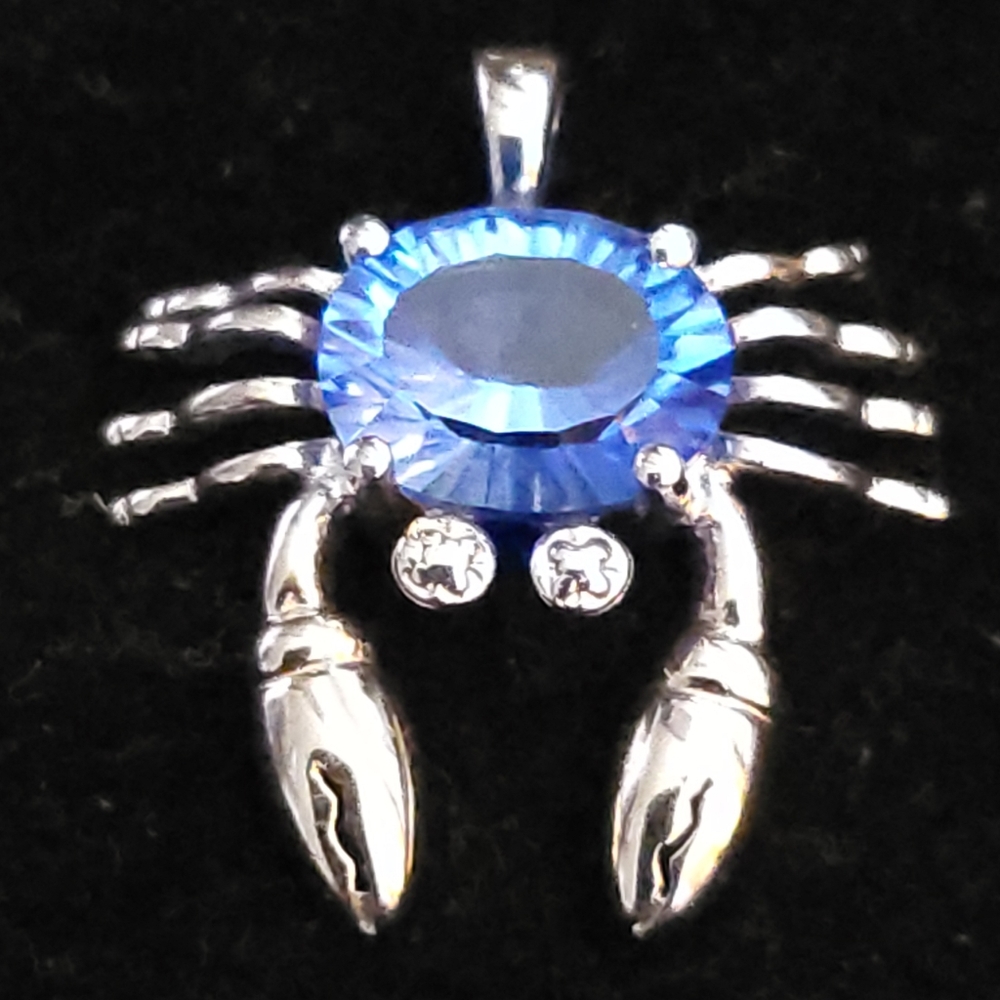 Blue Crab looks great in 1.5 Carats of Topaz!